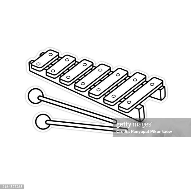 vector illustration of a colorful, eight-note xylophone is lying on a white background with its two mallets black and white drawing for children to learn to color according to the picture. - percussion instruments stock illustrations