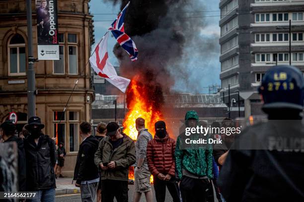 Far-right activists hold an 'Enough is Enough' protest on August 02, 2024 in Sunderland, England. After the murders of three girls in Southport...