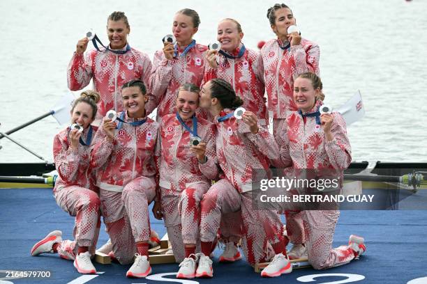 Canada's silver medallists Jessica Sevick, Caileigh Filmer, Maya Meschkuleit, Kasia Gruchalla-Wesierski, Avalon Wasteneys, Sydney Payne, Kristina...
