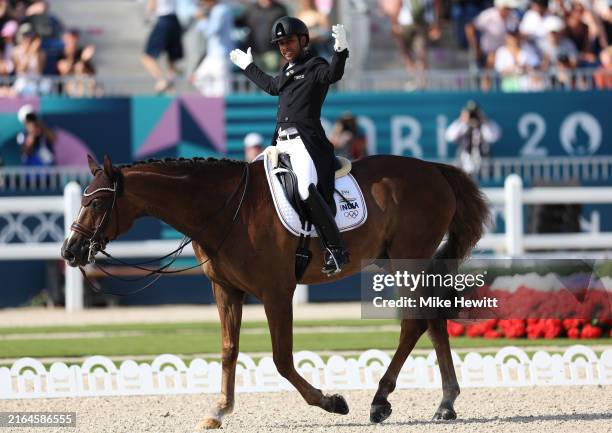 Anush Agarwalla and horse Sir Caramello Old of Team India celebrate after their routine in the Dressage Grand Prix Team and Individual Qualifier on...