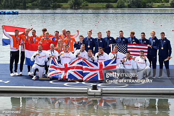 Netherlands' silver medallists Ralf Rienks, Olav Molenaar, Sander De Graaf, Ruben Knab, Gert-Jan van Doorn, Jacob van de Kerkhof, Jan van der Bij and...