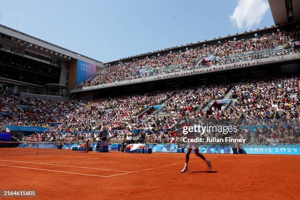 General view inside Court Philippe-Chatrier as Novak Djokovic of Team Serbia plays a backhand against Dominik Koepfer of Team Germany during the...