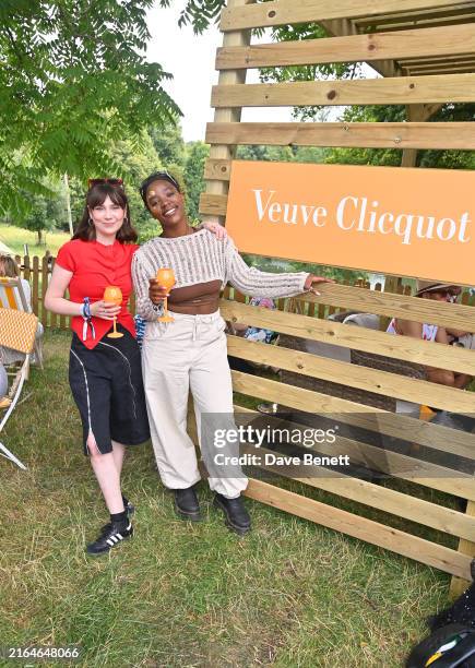 Jenny Walser and Corinna Brown attend the Veuve Clicquot Champagne Garden at Wilderness Festival 2024 at Cornbury Park on August 3, 2024 in...