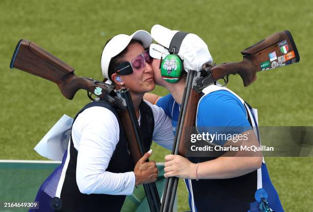 Adriana Ruano Oliva of Team Guatemala and Silvana Maria Stanco of Team Italy embrace after winning the gold and silver medals respectively after...