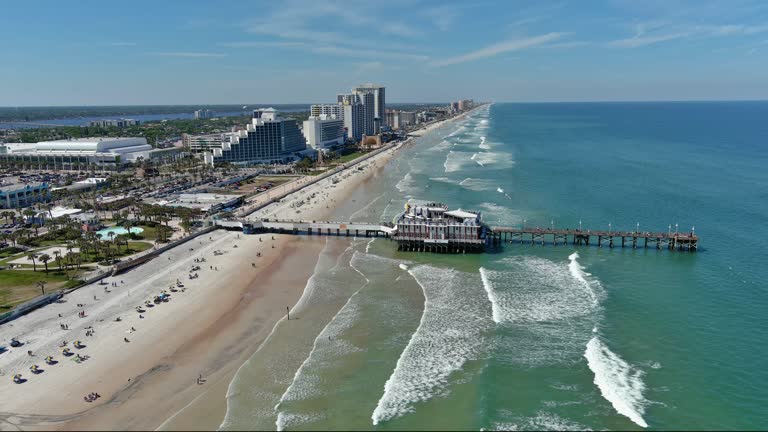 https://media.gettyimages.com/id/2164662843/video/daytona-beach-aerial-coastline-fly-back-north-view.jpg?b=1&s=640x640&k=20&c=goX4BgWuTc_LLptDskSGAV0Jmcp6eWJmBtkZPhX5UUY=