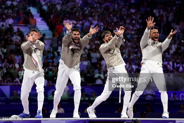 Team France celebrate winning the Men's Sabre Team Bronze Medal Match between Team Islamic Republic of Iran and Team France on day five of the...