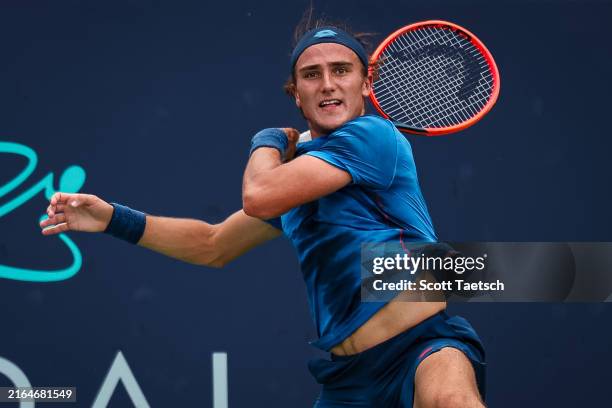 Mattia Bellucci returns a shot against Alex Michelsen during day 5 of the Mubadala Citi DC Open 2024 at William H.G. FitzGerald Tennis Center on July...