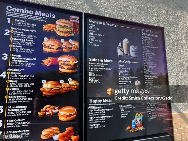 Close-up of McDonald's drive-thru menu board displaying combo meals, sides, and desserts, Mount Diablo Boulevard, Lafayette, California, July 30,...