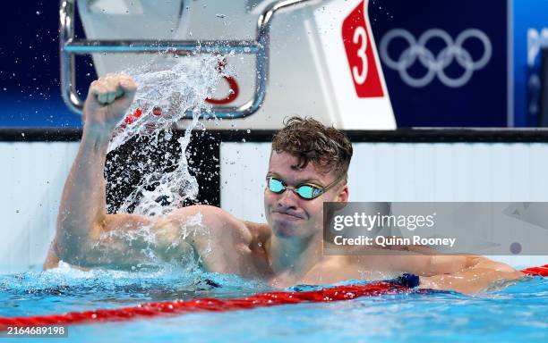 Leon Marchand of Team France celebrates after winning gold in the Men's 200m Breaststroke Final on day five of the Olympic Games Paris 2024 at Paris...