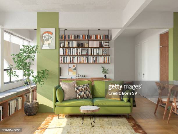 student's room with green sofa - soggiorno foto e immagini stock