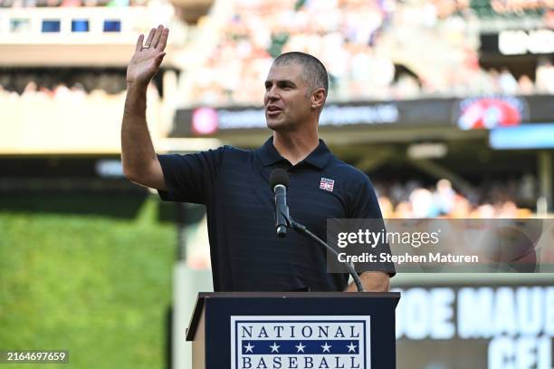 Former Minnesota Twins player Joe Mauer addresses fans during a pregame celebration of Mauer's Baseball Hall of Fame entry earlier this summer before...