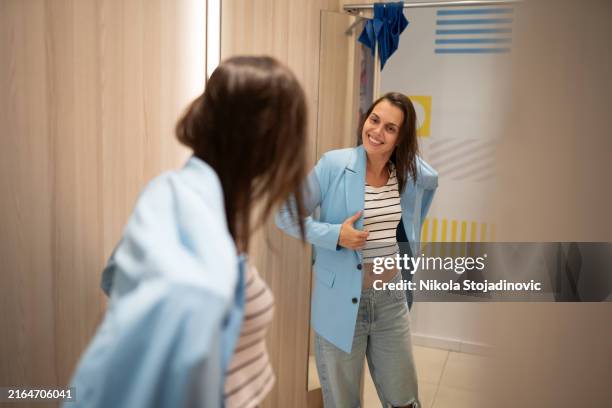 i like this jacket - fitting room mirror stock pictures, royalty-free photos & images