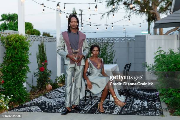 gorgeous black couple dress in high fashion at a party - glamour foto e immagini stock