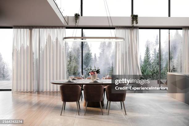 modern cabin dining room interior with large windows - eetkamer stockfoto's en -beelden