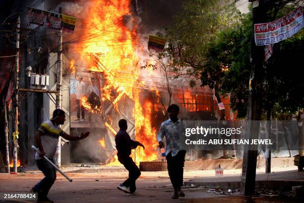 Garment store is reportedly set ablaze by a group of unidentified miscreants in Dhaka on August 4, 2024.