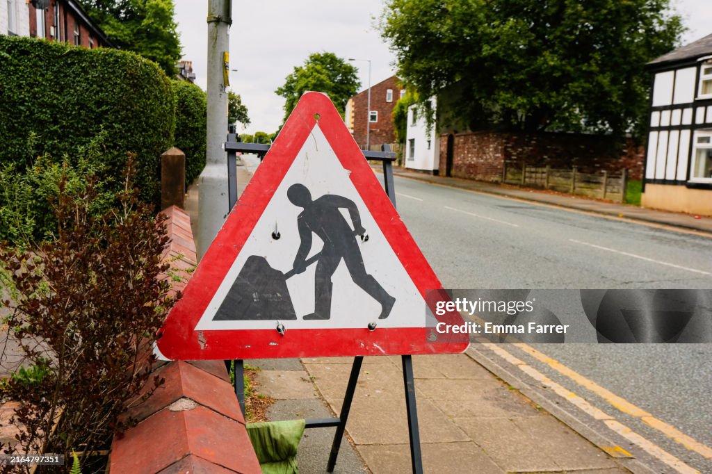 Road sign on suburban street