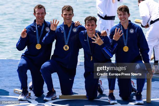 Gold medallists, Nick Mead of USA, Justin Best of USA, Michael Grady of USA and Liam Corrigan of USA pose on the podium during the medal ceremony...