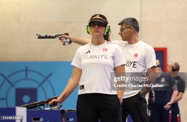 Turkey's Yusuf Dikec competes in the shooting 10m air pistol mixed team gold medal match on day four of the Olympic Games Paris 2024 at Chateauroux...