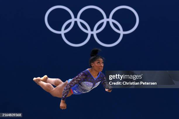 Simone Biles of Team United States competes in the floor exercise during the Artistic Gymnastics Women's All-Around Final on day six of the Olympic...