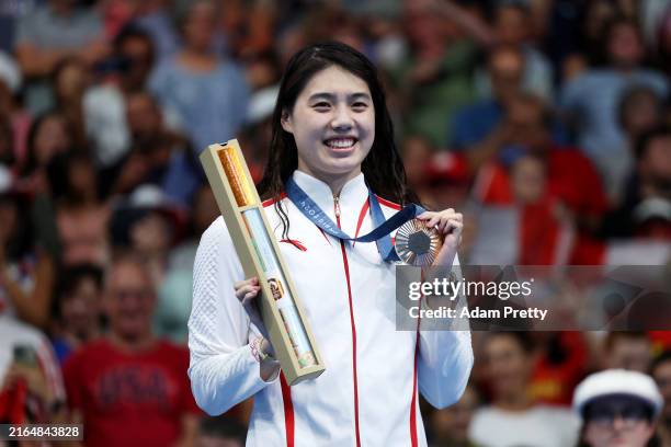 Bronze Medalist Zhang Yufei of Team People's Republic of China poses on the podium during the Swimming medal ceremony after the Women's 200m...