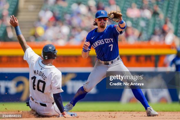 Bobby Witt Jr. #7 of the Kansas City Royals catches the throw to second base for the force out on Bligh Madris of the Detroit Tigers during the...