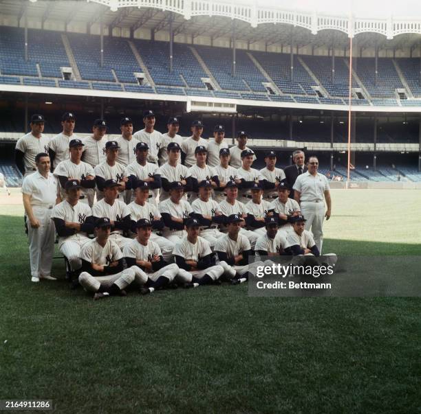 Team photo of the New York Yankees baseball team, New York, August 26th 1968. Front row: Batboys Elliot Ashley, Jack Gibbs, Dick Howser, Roy White,...