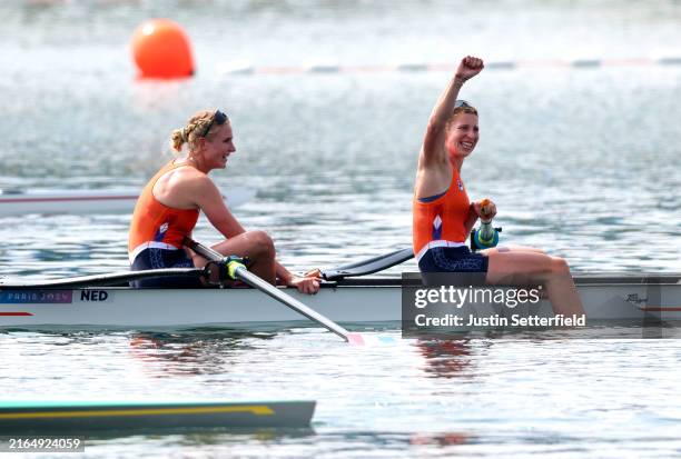 Ymkje Clevering and Voronique Meester of Team Netherlands celebrate winning the gold after competing in the Rowing Women's Pair Final A on day seven...