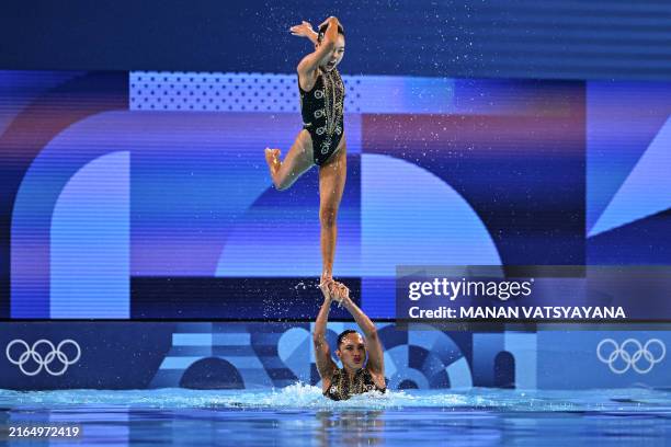 Team USA compete in the team technical routine of the artistic swimming event during the Paris 2024 Olympic Games at the Aquatics Centre in...