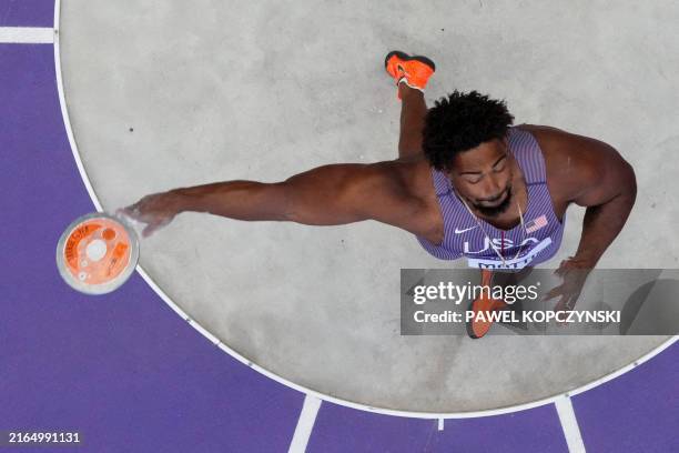 Sam Mattis competes in the men's discus throw qualification of the athletics event at the Paris 2024 Olympic Games at Stade de France in Saint-Denis,...