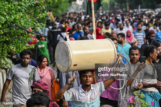 Local people are looting belongings from Prime Minister Sheikh Hasina's residence in Dhaka, Bangladesh, on August 5, 2024. Bangladesh army chief...