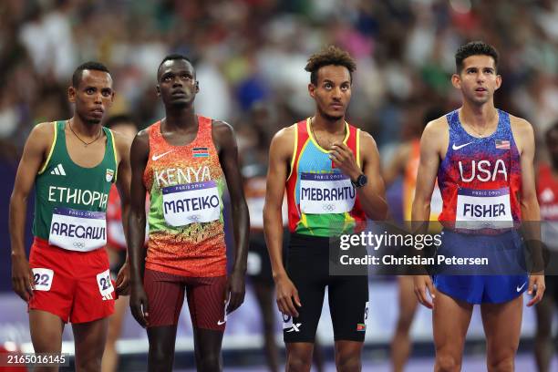 Berihu Aregawi of Team Ethiopia, Daniel Mateiko of Team Kenya, Merhawi Mebrahtu of Team Eritrea and Grant Fisher of Team United States look on during...