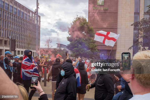 Far-right activists hold an Enough is Enough protest in Sunderland on August 02, 2024 in Sunderland, England. Mis-information spread on social media...