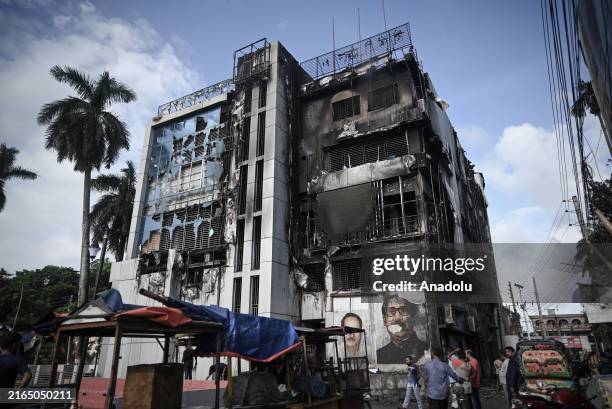 Divisional Awami League office is seen after being set on fire after the resignation of Prime Minister Sheikh Hasina on August 06, 2024 in Barishal,...