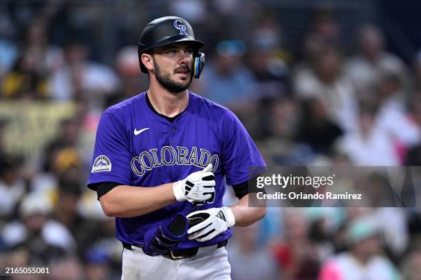 Kris Bryant of the Colorado Rockies looks on after being hit by a pitch during the fourth inning against the San Diego Padres at Petco Park on August...