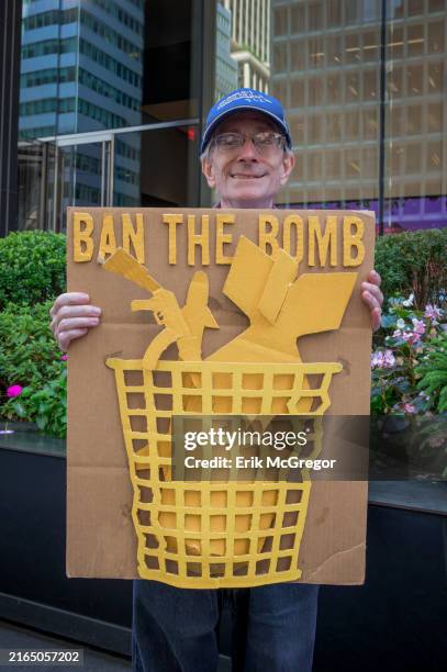 Participant seen holding a sign at the protest. A group of Anti-War, Anti-Nuclear activists and allies congregated in front of the Consulate General...