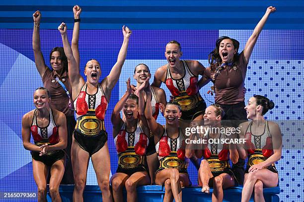 Team Canada celebrate after receiving their score in the team free routine of the artistic swimming event during the Paris 2024 Olympic Games at the...