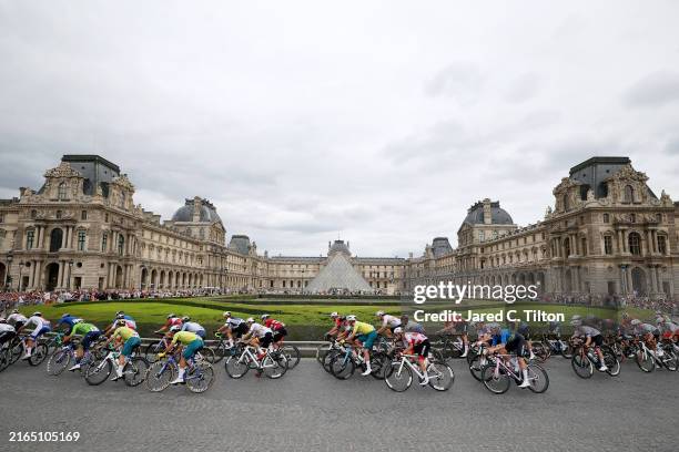 General view of the peloton compete passing by the Louvre Museum during the Men's Road Race on day eight of the Olympic Games Paris 2024 at trocadero...