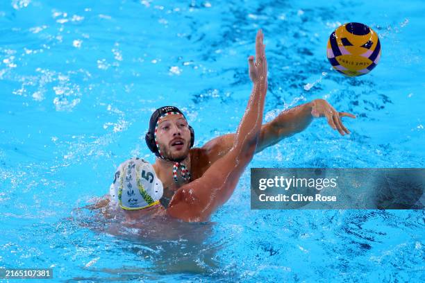 Gergo Zalánki of Team Hungary shoots past Nathan Power of Team Australia in the Men's Preliminary Round - Group B match between Team Australia and...