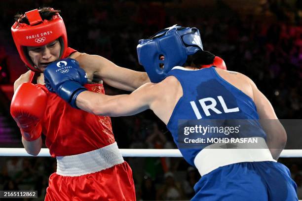 China's Yang Wenlu and Ireland's Kellie Harrington compete in the women's 60kg final boxing match during the Paris 2024 Olympic Games at the...