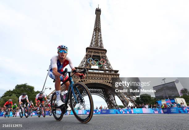 Christophe Laporte of Team France competes with the Eiffel Tower in the background during the Men's Road Race on day eight of the Olympic Games Paris...