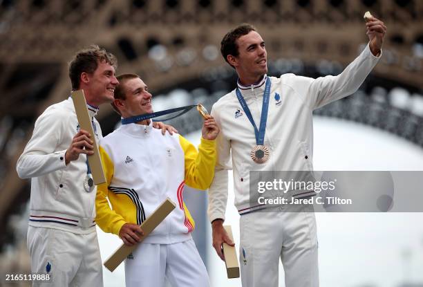 Gold medalist Remco Evenepoel of Team Belgium , Silver medalist Valentin Madouas of Team France and Bronze medalist Christophe Laporte of Team France...