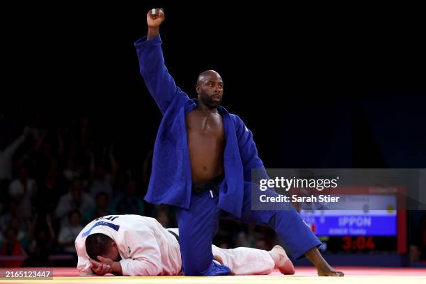 Teddy Riner of Team France celebrates his victory against Tatsuru Saito of Team Japan in the Men +90kg during the Judo Mixed Team Final on day eight...