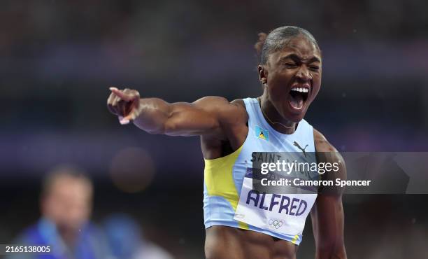 Julien Alfred of Team Saint Lucia celebrates winning the gold medal during the Women's 100m Final on day eight of the Olympic Games Paris 2024 at...