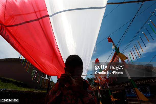 They are unfurling the 1-kilometer-long Indonesian flag in Majalengka, West Java, Indonesia, on Wednesday, August 7, 2024. The 1-kilometer-long...