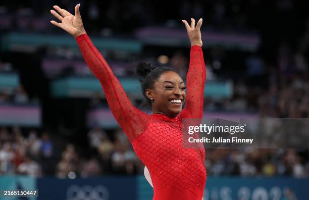 Simone Biles of Team United States celebrates after finishing her routine during the Artistic Gymnastics Women's Vault Final on day eight of the...