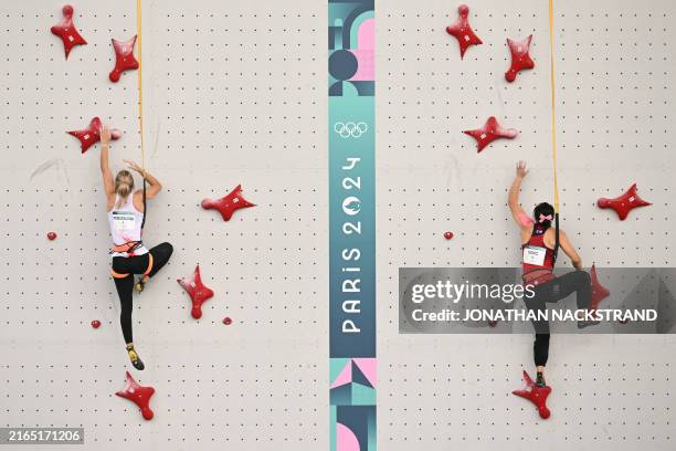 Poland's Aleksandra Miroslaw competes against China's Deng Lijuan in the women's sport climbing speed final during the Paris 2024 Olympic Games at Le...
