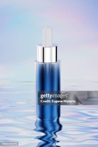 blue cosmetic container placed on a reflective, rippled surface. beauty in minimalism. - water in jar stock pictures, royalty-free photos & images