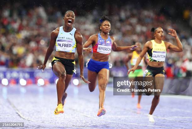 Julien Alfred of Team Saint Lucia crosses the finish line during the Women's 100m Final on day eight of the Olympic Games Paris 2024 at Stade de...