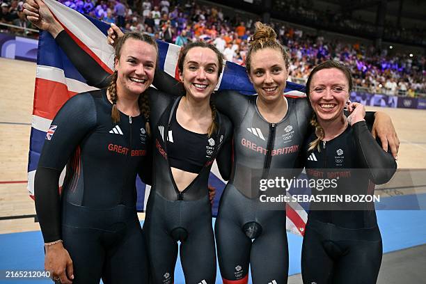 Britain's Jessica Roberts, Britain's Elinor Barker, Britain's Josie Knight and Britain's Anna Morris pose after winning the women's track cycling...