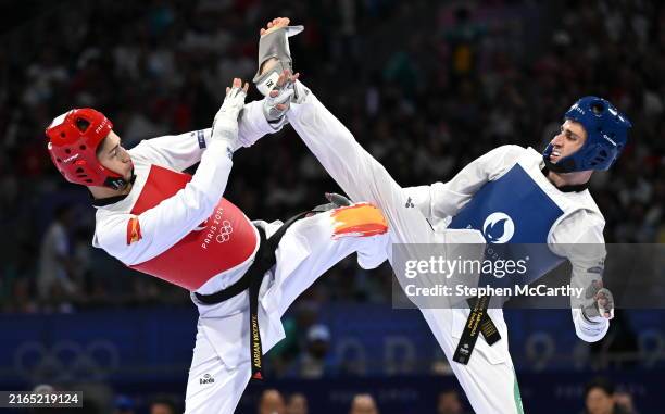 Paris , France - 7 August 2024; Jack Woolley of Team Ireland, right, in action against Adrian Vincente Yunta of Team Spain during the men's -58kg...